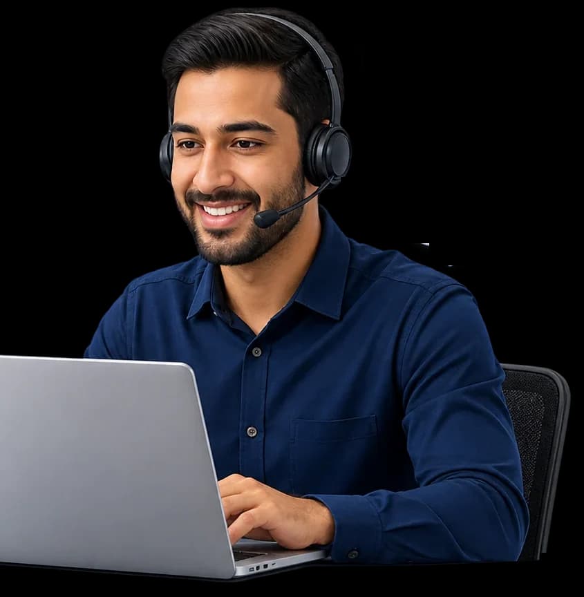A support engineer at a laptop, ready to help